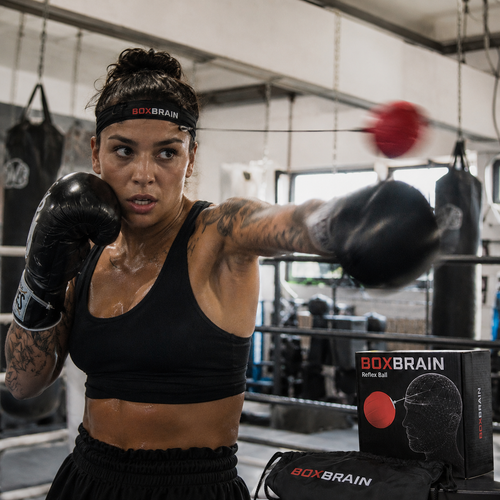 BOXBRAIN reflex ball used by female boxer in training